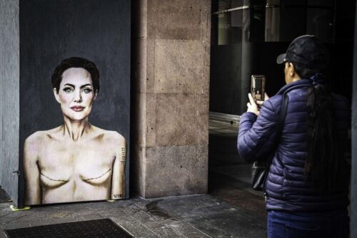 Angelina Jolie mural with signs of mastectomy on International Day against breast cancer